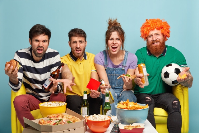 images/puzzled-football-fans-feels-displeased-as-their-favorite-team-got-red-card-eat-fast-food-sit-comfortable-couch-isolated-blue-wall-sport-caution-game-television-concept.jpg